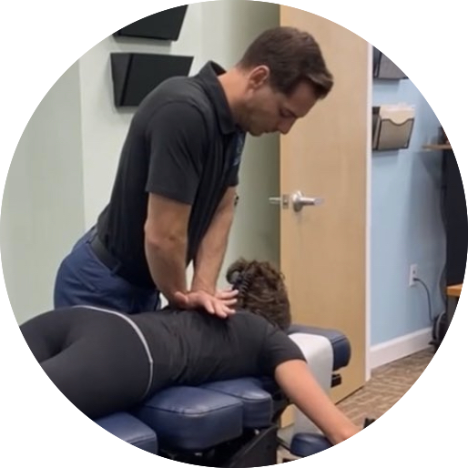 Chiropractor giving adjustment