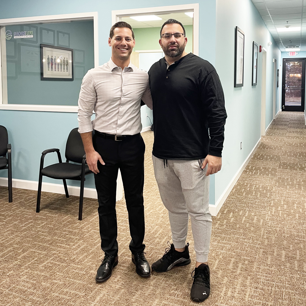 Dr. Brett together with a patient